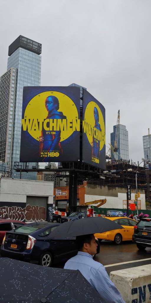 Regina King on the "Watchmen" poster outside New York Comic-con 2019